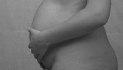 Udflåd gravid gult Graviditetssymptomer